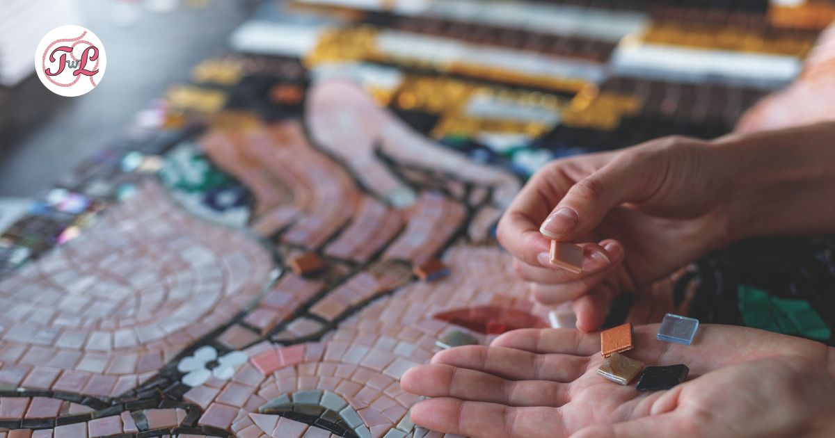 a girl holding mosaic pieces to work on a art