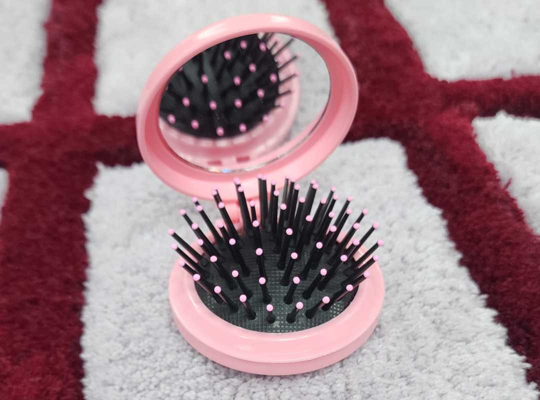 pocket mirror brush